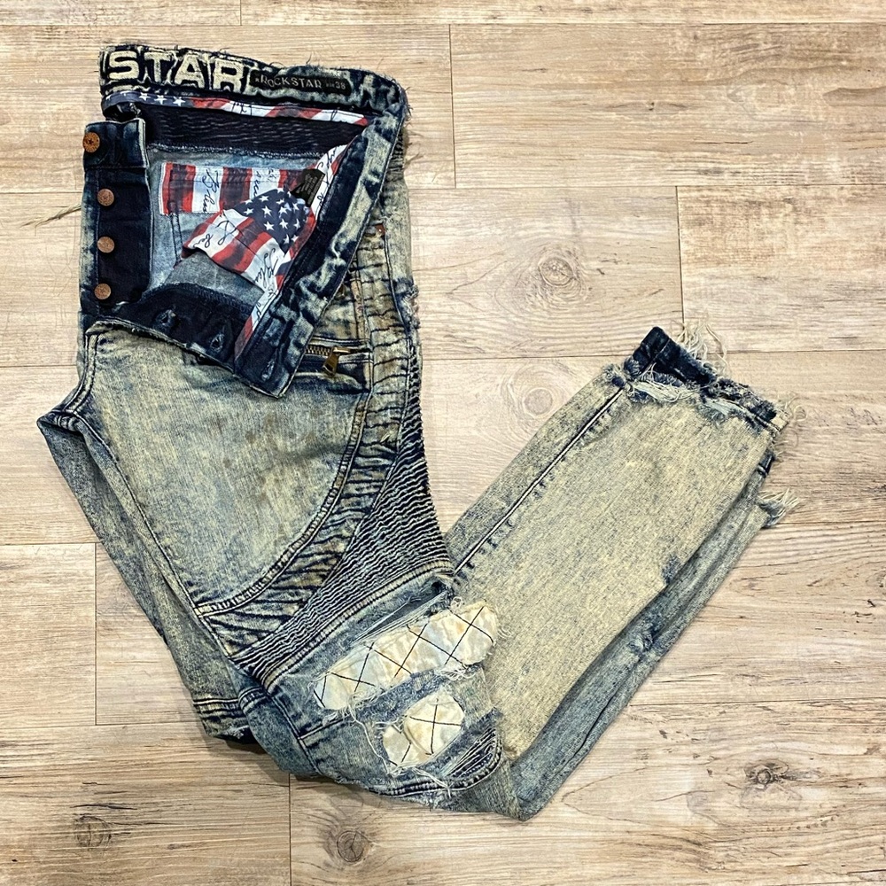 Rockstar Men's Distressed and Rugged Blue Jeans size W38
